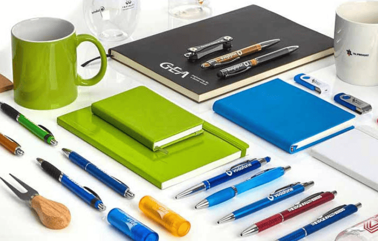 Branded promotional products arranged on a table